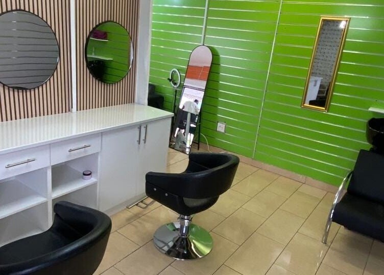 Modern salon chairs and mirrors at BusiNails, Centurion, Gauteng, ZA.