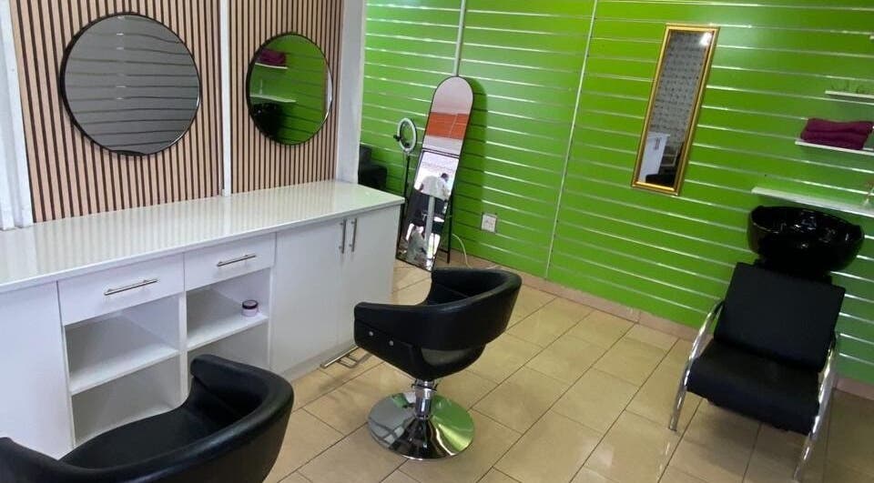 Modern salon chairs and mirrors at BusiNails, Centurion, Gauteng, ZA.