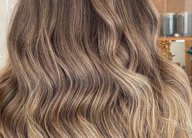 Elegant wavy hair styled at Lauren Willett Bespoke Hair the Loft, Bexhill, England, GB.