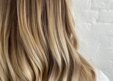 Blonde hair with soft waves at Lauren Willett Bespoke Hair the Loft. By Westworks Collective, Bexhill, England, GB.