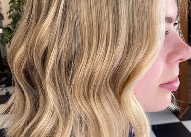 Blonde wavy hairstyle at Lauren Willett Bespoke Hair the Loft. By Westworks Collective in Bexhill, England, GB.