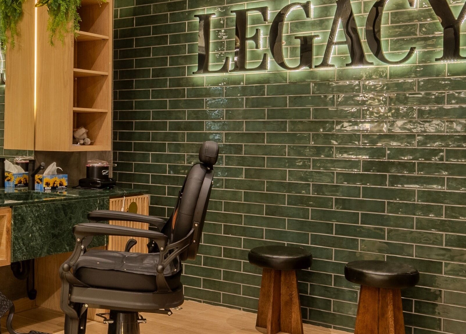 Elegant interior of Legacy Barbers - The Verge, Johannesburg, Gauteng, ZA with modern barber chair.
