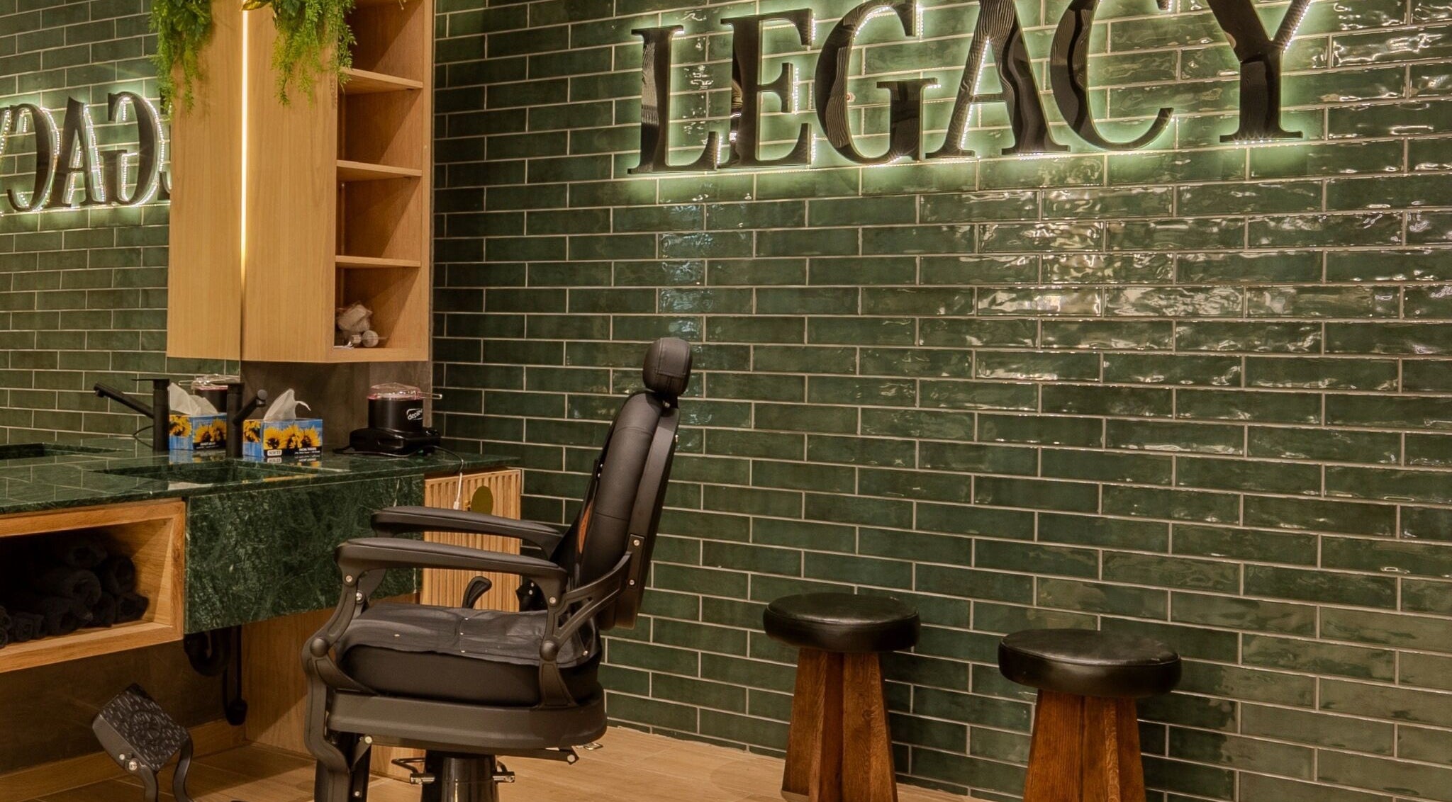 Elegant interior of Legacy Barbers - The Verge, Johannesburg, Gauteng, ZA with modern barber chair.