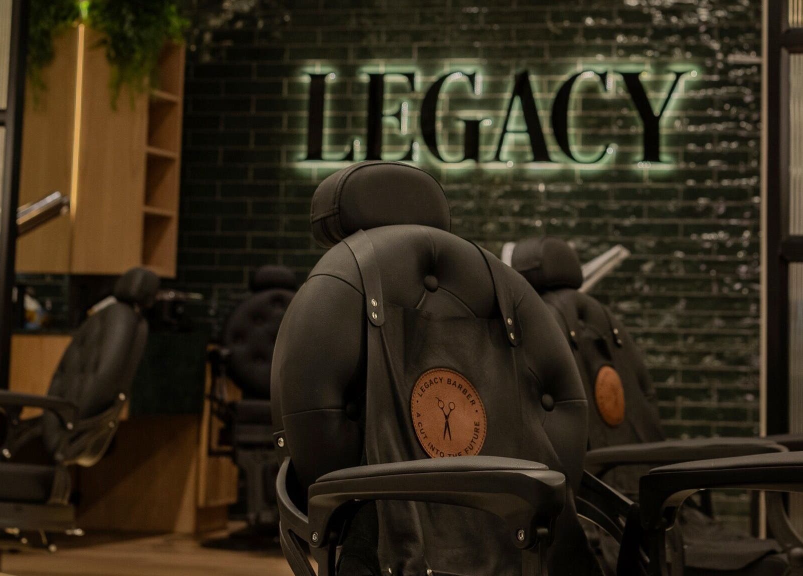Luxurious chairs in Legacy Barbers - The Verge, Johannesburg, Gauteng, ZA, highlighting premium grooming space.