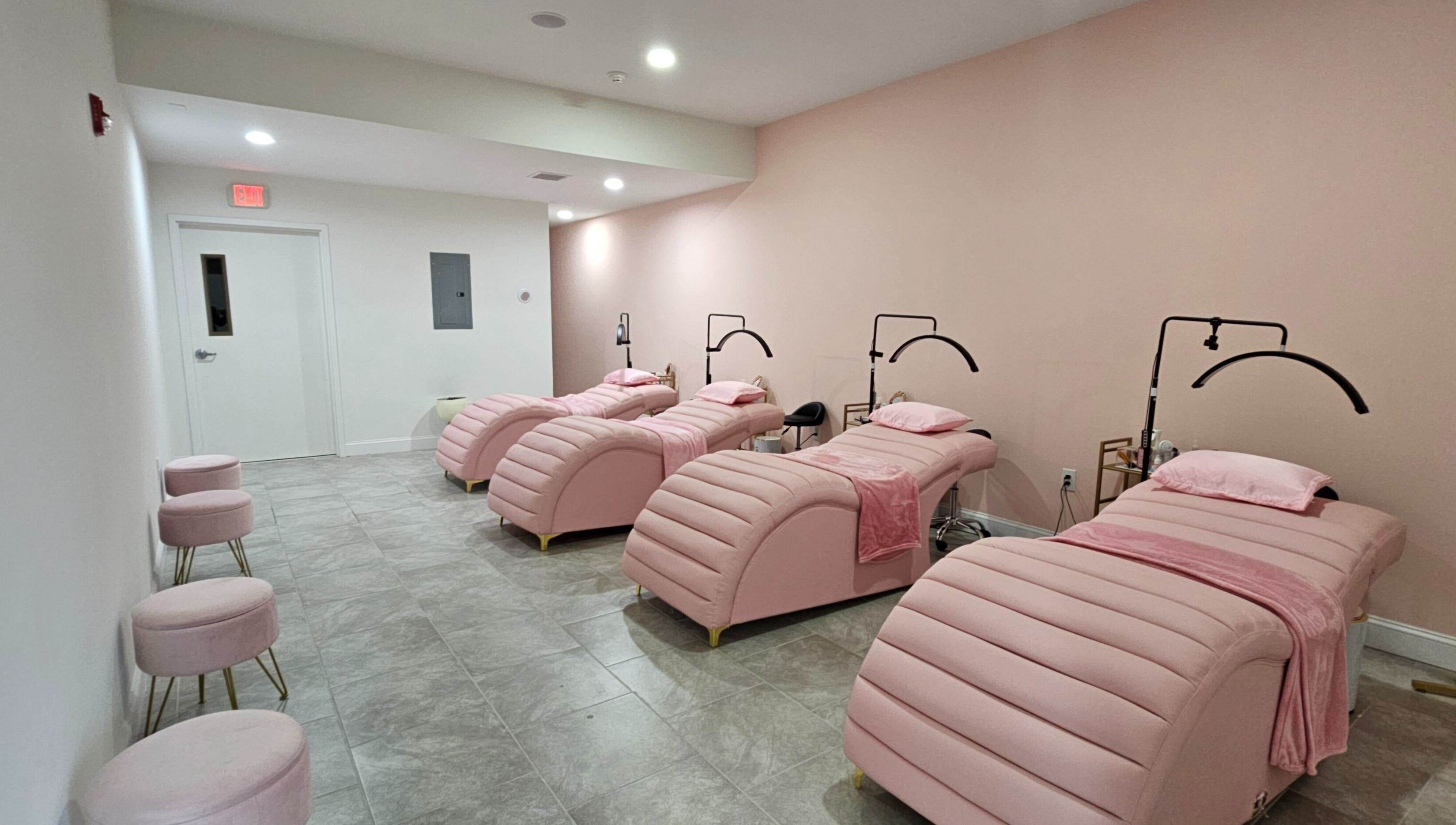 Cozy pink treatment room at Majestic Day Spa - Acton, MA, offering top wellness services in Acton, Massachusetts, US.