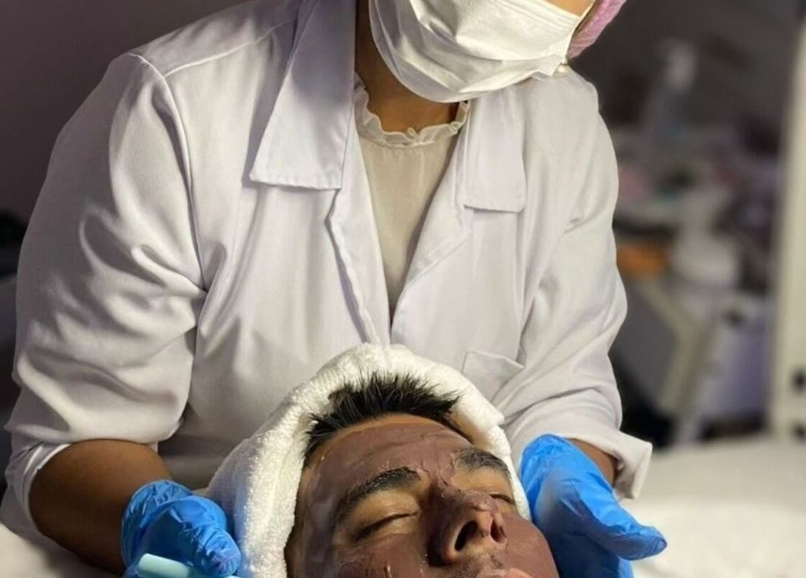 Aesthetician performing a facial treatment at Majestic Day Spa - Acton, MA in Acton, Massachusetts, US.