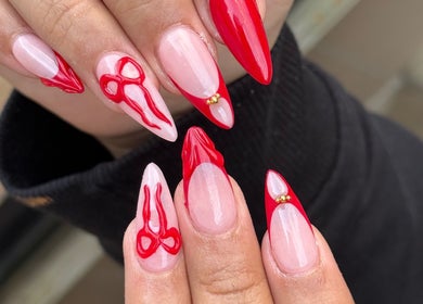 Chic red nail art at Turbo Nails - Burnsville, MN. Stunning designs in Burnsville, Minnesota, US.