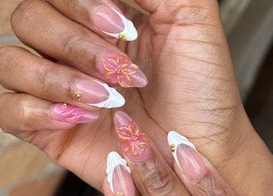 Elegant nail art with floral designs at Turbo Nails - Burnsville, MN, located in Burnsville, Minnesota, US.