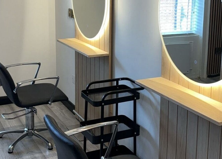 Modern styling chair and lit mirror at The Hair Room, Dublin, County Dublin, IE.
