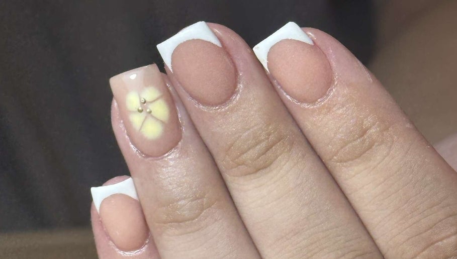 Stylish nail art with floral design at Nails by Aisha, Pudsey, England, GB. Perfect for beauty enhancements.