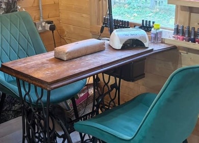 Cozy nail station at Aimez Vous, Marks Tey, England, GB, featuring vintage decor and elegant seating.