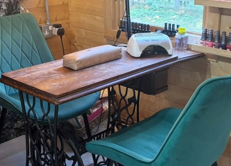 Cozy nail station at Aimez Vous, Marks Tey, England, GB, featuring vintage decor and elegant seating.