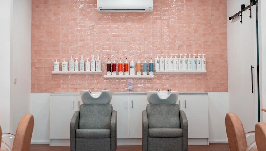 Luxurious shampoo chairs at HairyAdelaide, Mona Vale, New South Wales, AU with chic tile backdrop.