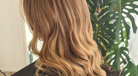 Elegant golden waves styled at HairbyMrsBlades, Porirua, Wellington Region, NZ. Natural beauty enhancement.