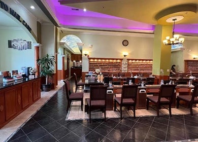 Chic and welcoming interior of Athena nail spa in Naperville, Illinois, US showcasing manicure stations.