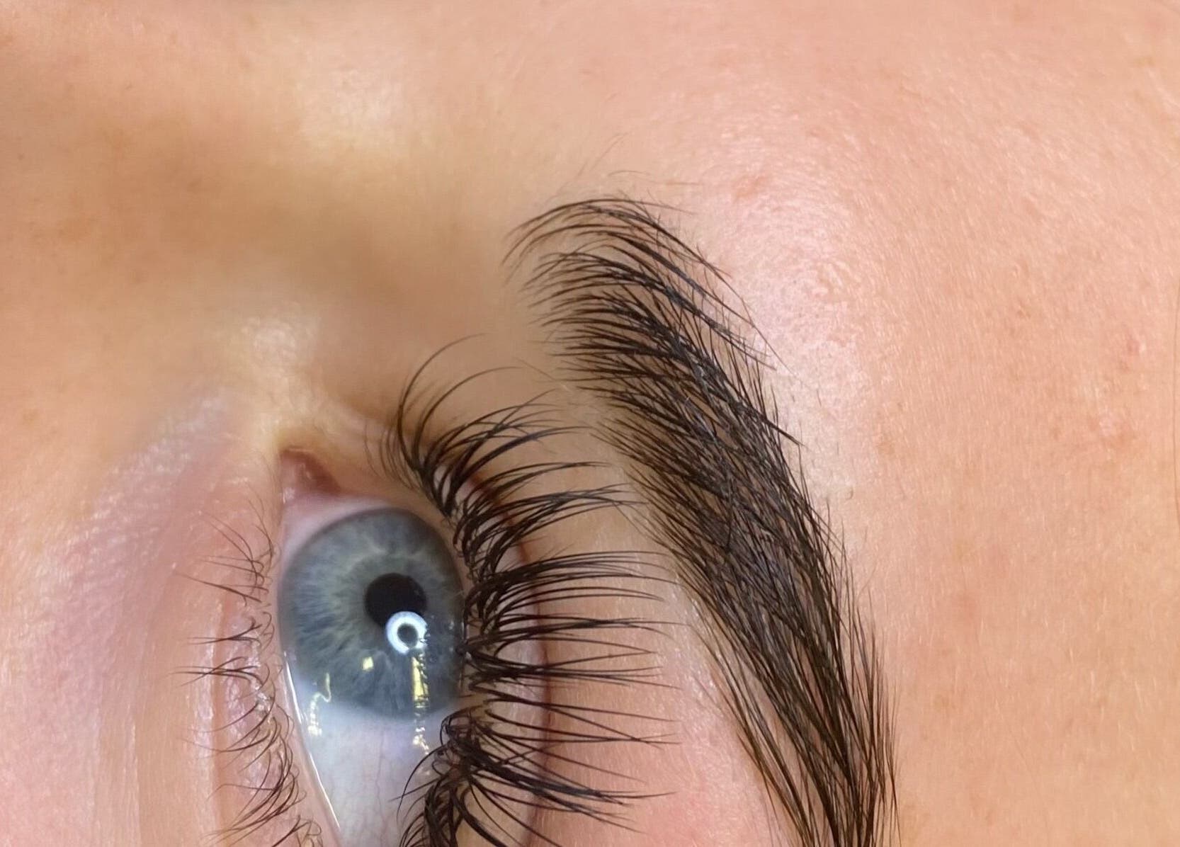 Close-up of perfectly groomed eyebrow and lashes at Nita Beauty, Melbourne, Victoria, AU.