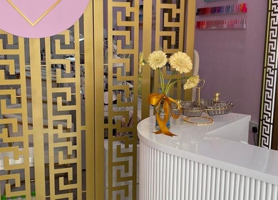 Hello Dolly Beauty Center reception with golden decor in Doha, Doha Municipality, QA.