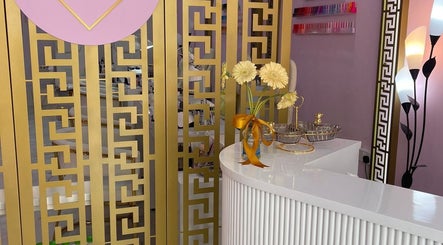 Hello Dolly Beauty Center reception with golden decor in Doha, Doha Municipality, QA.