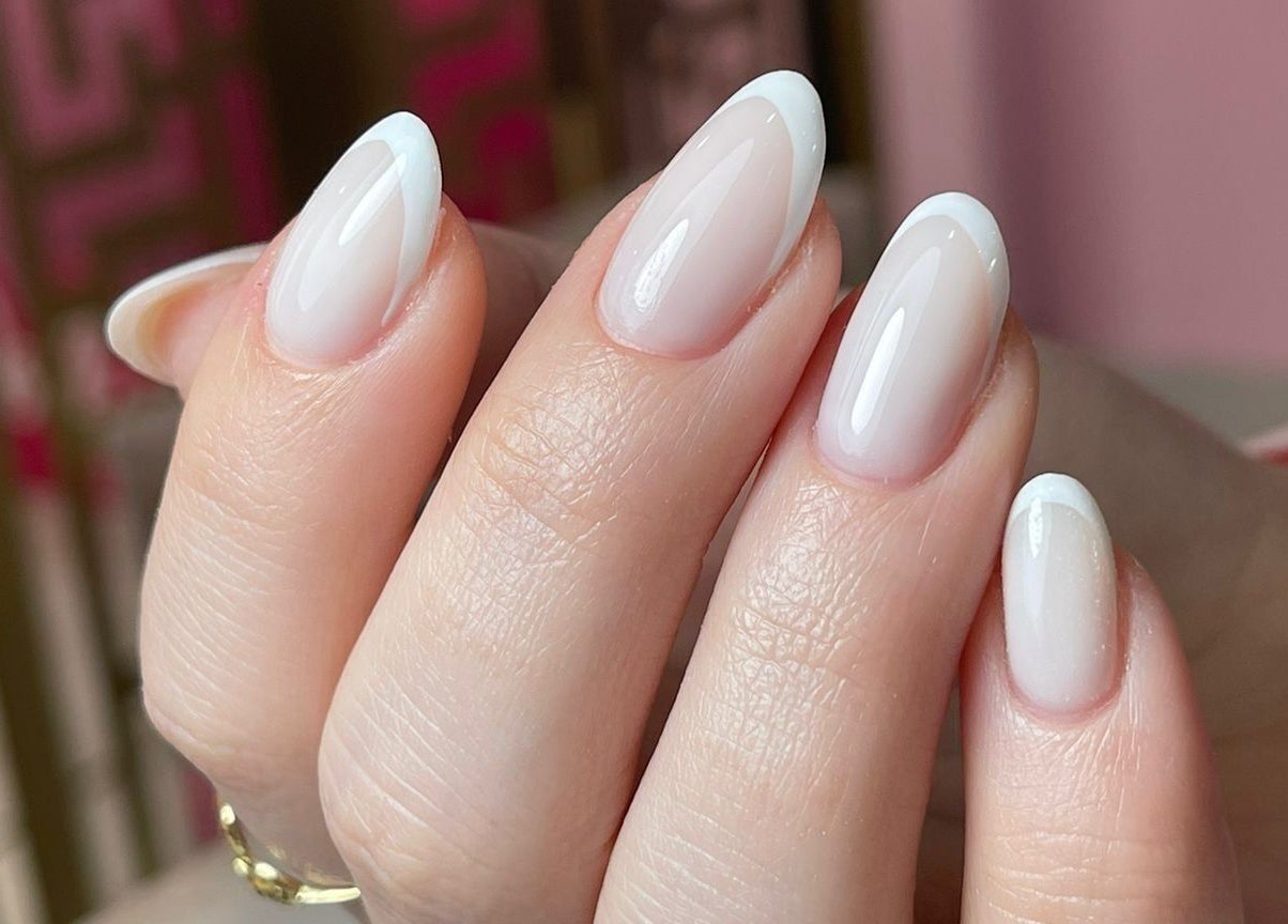 Elegant French manicure at Hello Dolly Beauty Center, Doha, Doha Municipality, QA.