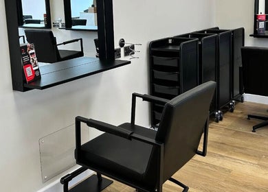 Modern styling chair at Defined Aesthetics & Beauty, Gamlingay, England, GB. Elegant design and comfort.