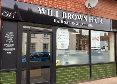 Defined Aesthetics & Beauty salon front in Gamlingay, England, GB, showcasing sleek design.