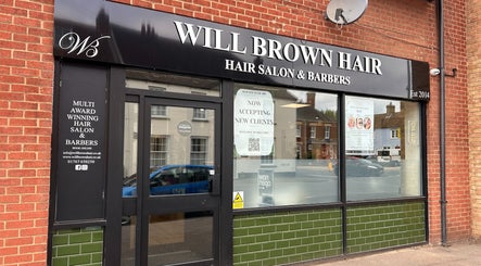 Defined Aesthetics & Beauty salon front in Gamlingay, England, GB, showcasing sleek design.