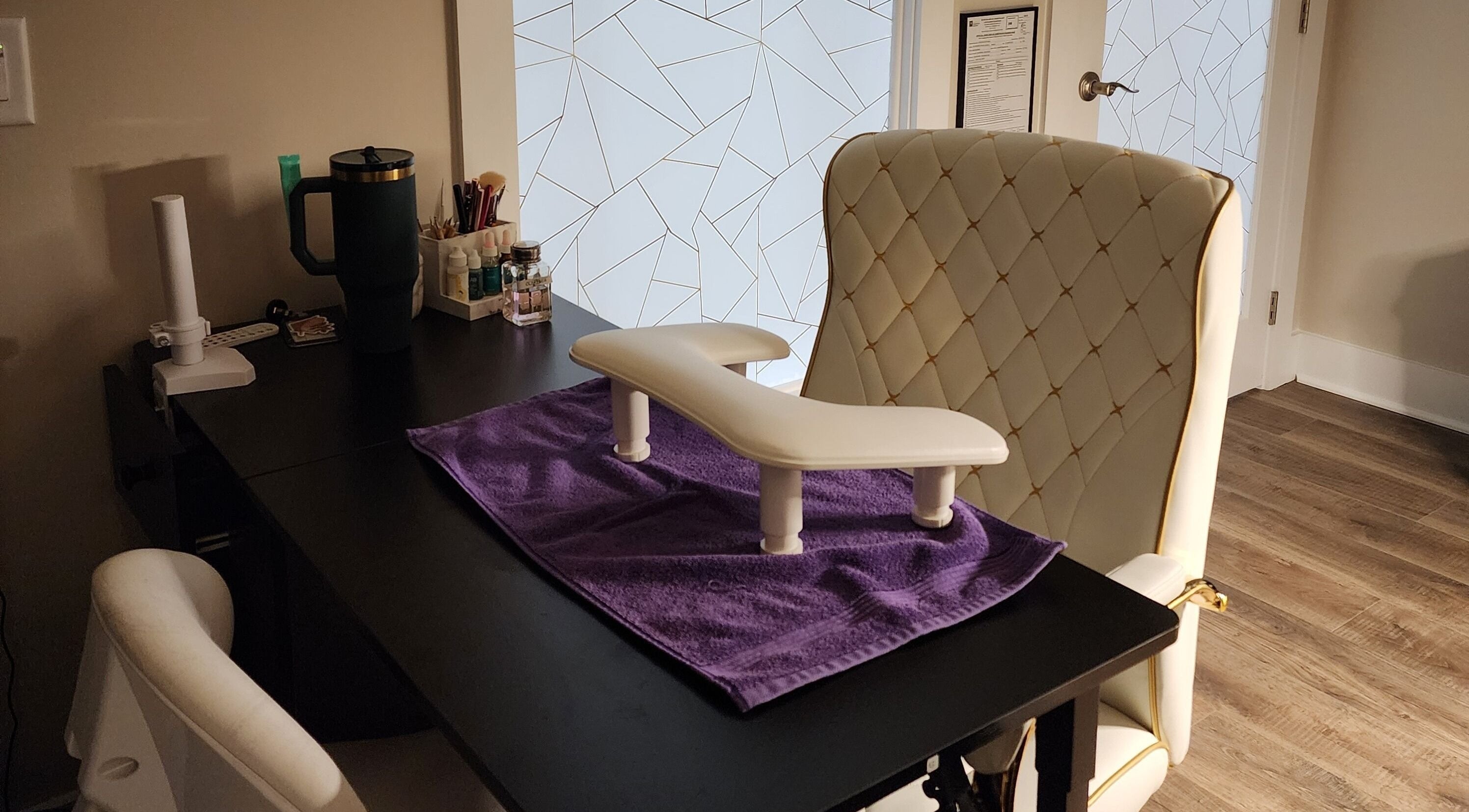 Luxurious nail station at Golden Kate Nails in Clarksville, Tennessee, US, featuring plush seating and tools.