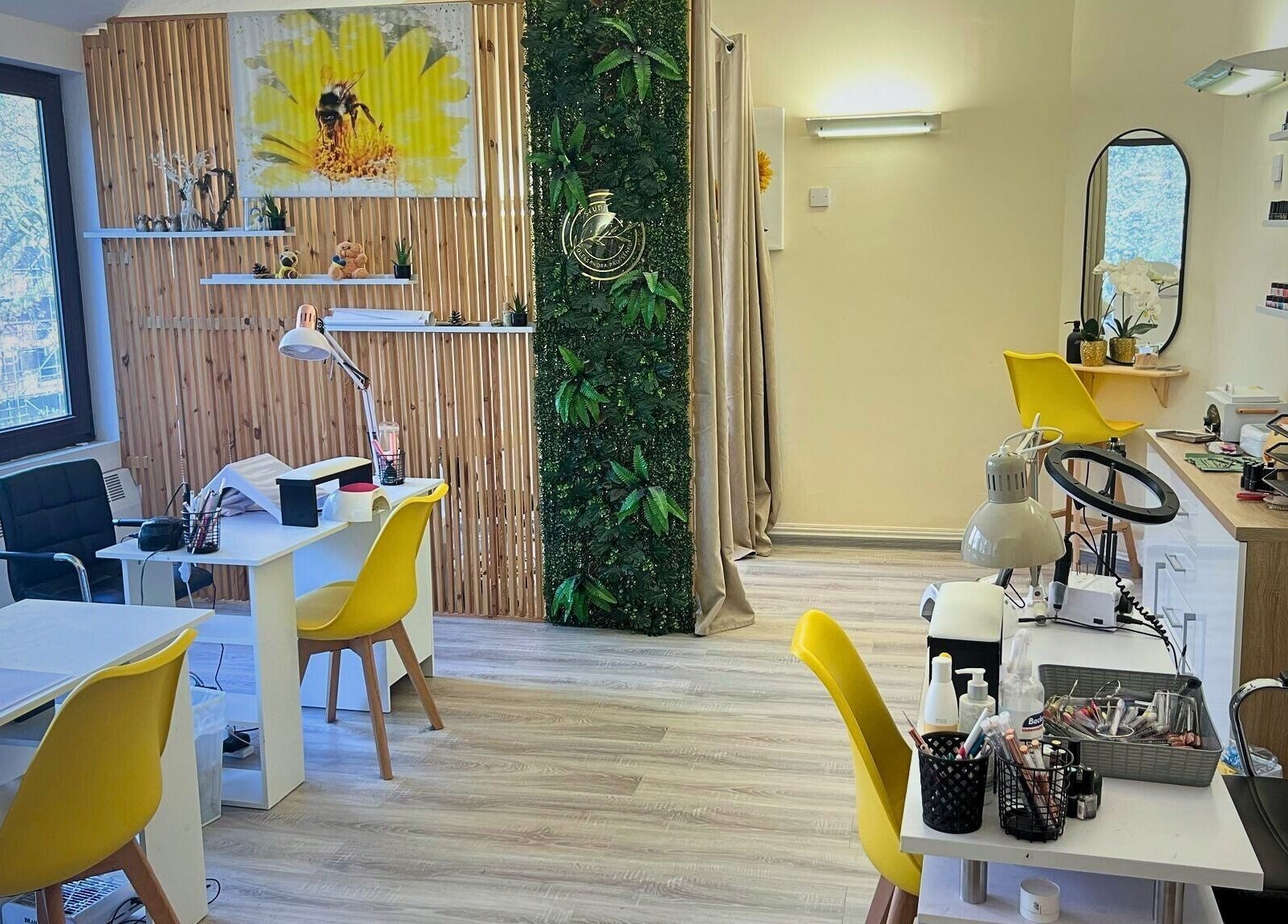 Interior view of Studio Oleksandra Protsenko in Nottingham, England, GB, showcasing bright, modern beauty stations.