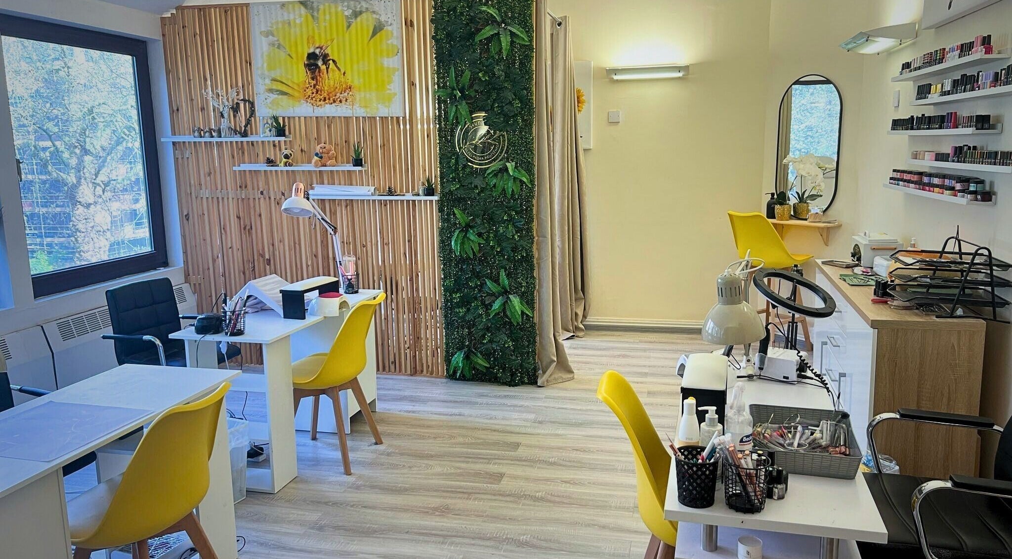 Interior view of Studio Oleksandra Protsenko in Nottingham, England, GB, showcasing bright, modern beauty stations.