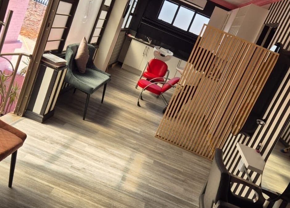 CheZel & Co salon in Springs, Gauteng, ZA with modern decor and comfortable seating.