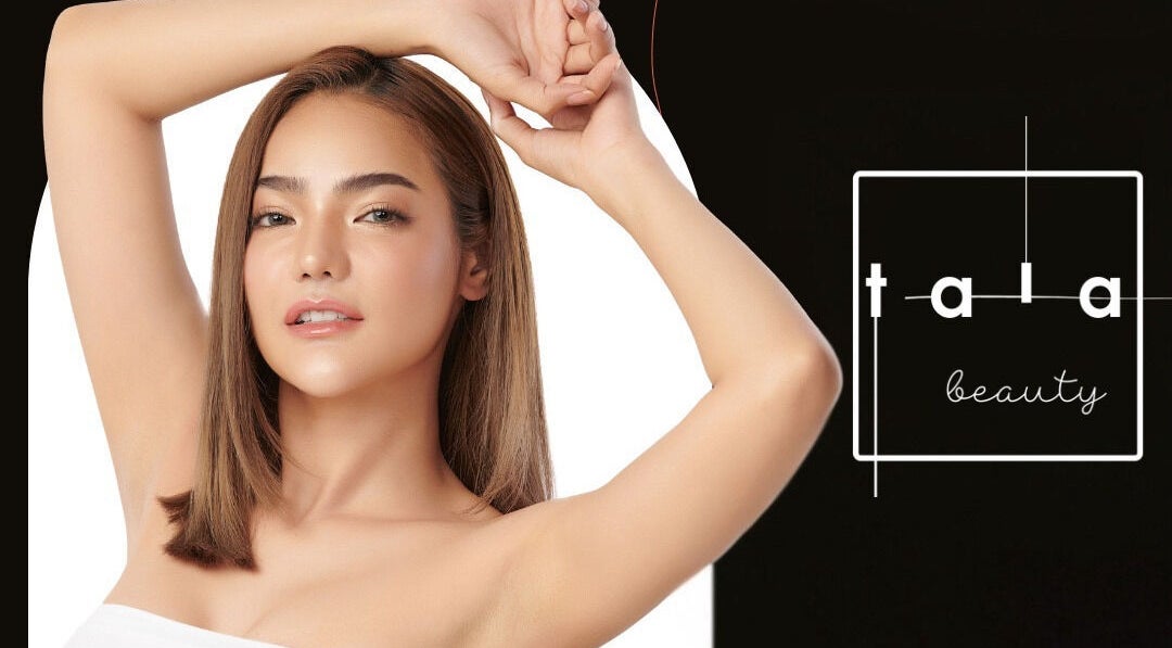 A model showcasing beauty at Tala Beauty Bar, Toronto, Ontario, CA with a sleek hairstyle and glowing skin.