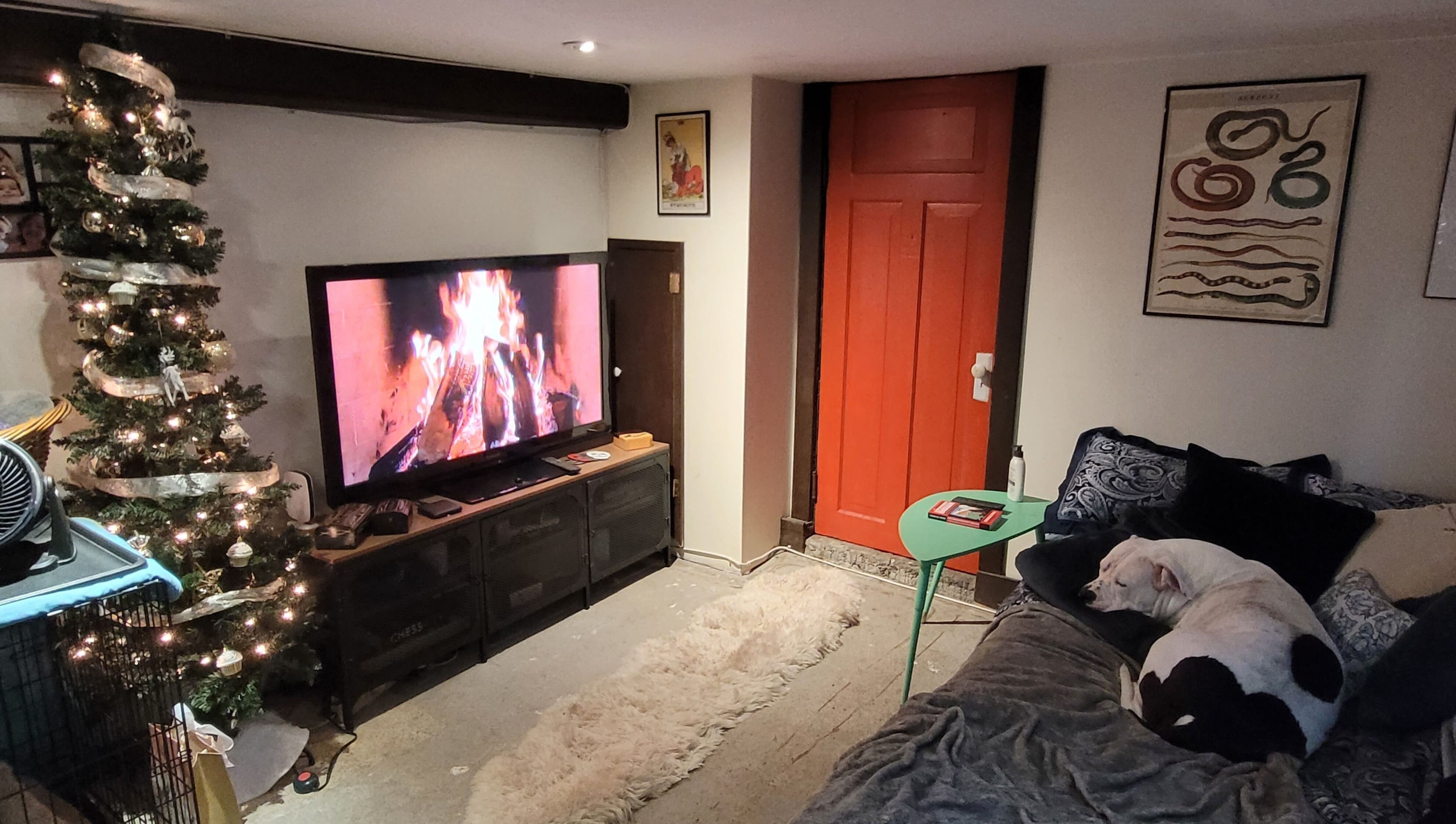 Styled By Tylore's inviting interior with a lit fireplace and festive decor in Vancouver, British Columbia, CA.