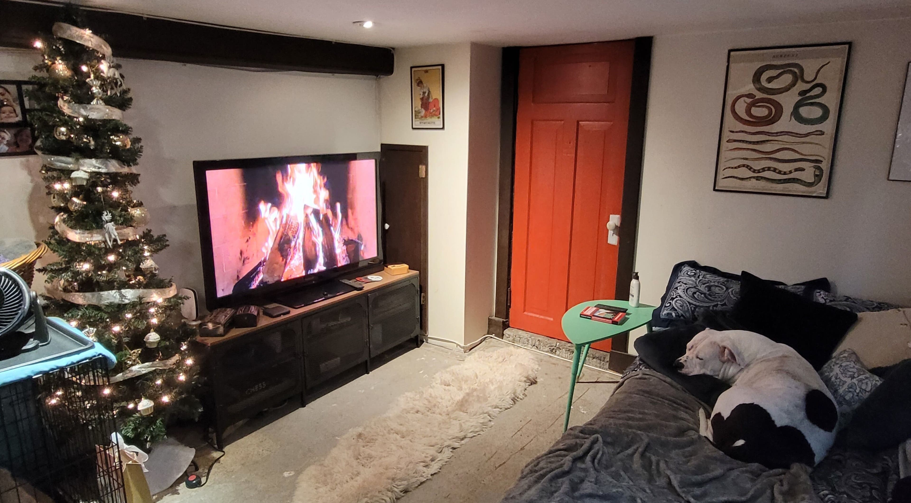 Styled By Tylore's inviting interior with a lit fireplace and festive decor in Vancouver, British Columbia, CA.