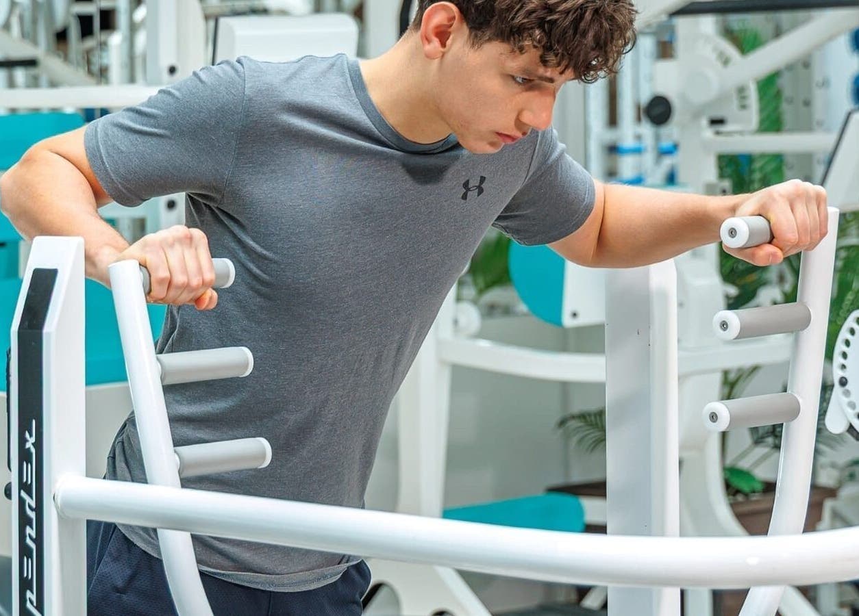 Man working out at Sierra Blanca Personal trainings studio, Marbella, Andalucía, ES. Focused exercise scene.