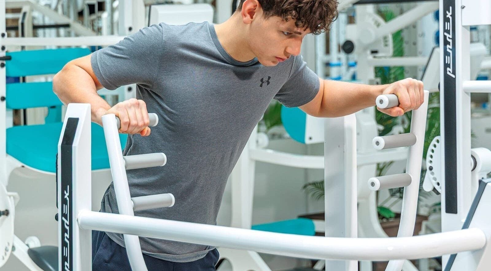 Man working out at Sierra Blanca Personal trainings studio, Marbella, Andalucía, ES. Focused exercise scene.