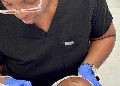 Aesthetician performs facial treatment at The Thryve Clinic - Mobile Only, London, GB.