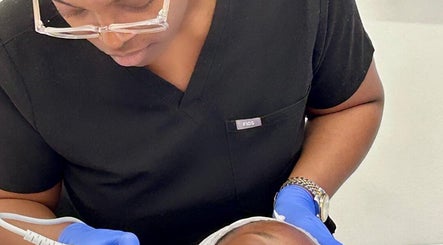 Aesthetician performs facial treatment at The Thryve Clinic - Mobile Only, London, GB.