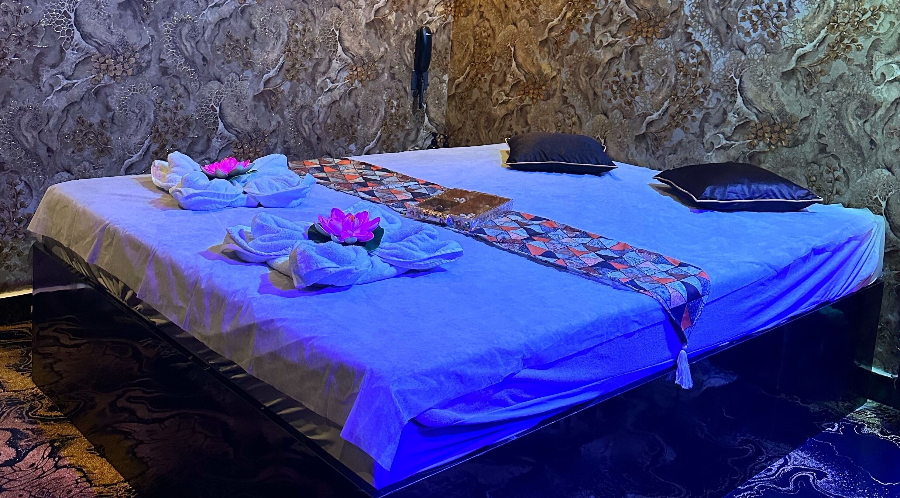 Relaxing massage room at Nahum International Thai Spa Indiranagar, Bengaluru, Karnataka, IN, inviting tranquility.