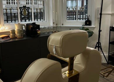 Elegant interior of Browserie London with cream chairs and decor in London, England, GB.