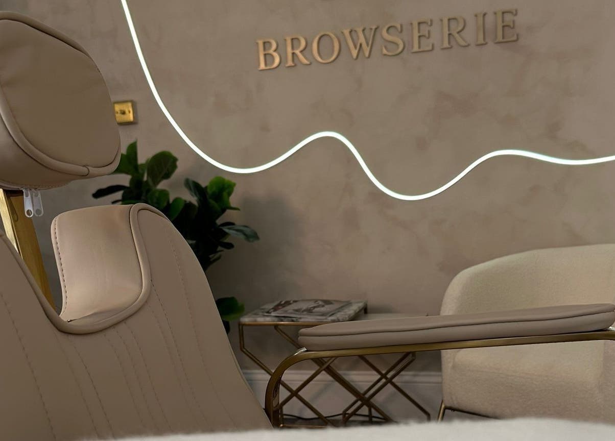 Elegant therapy room at Browserie London, featuring plush seating and modern decor, located in London, England, GB.