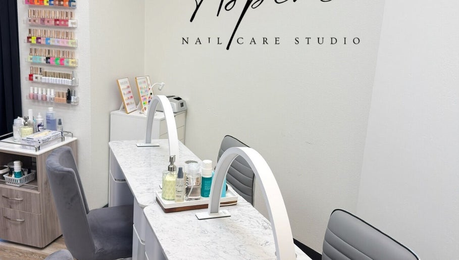 Cozy manicure stations at Aspire Nail Care Studio in Greenwood Village, Colorado, US, offering a serene experience.