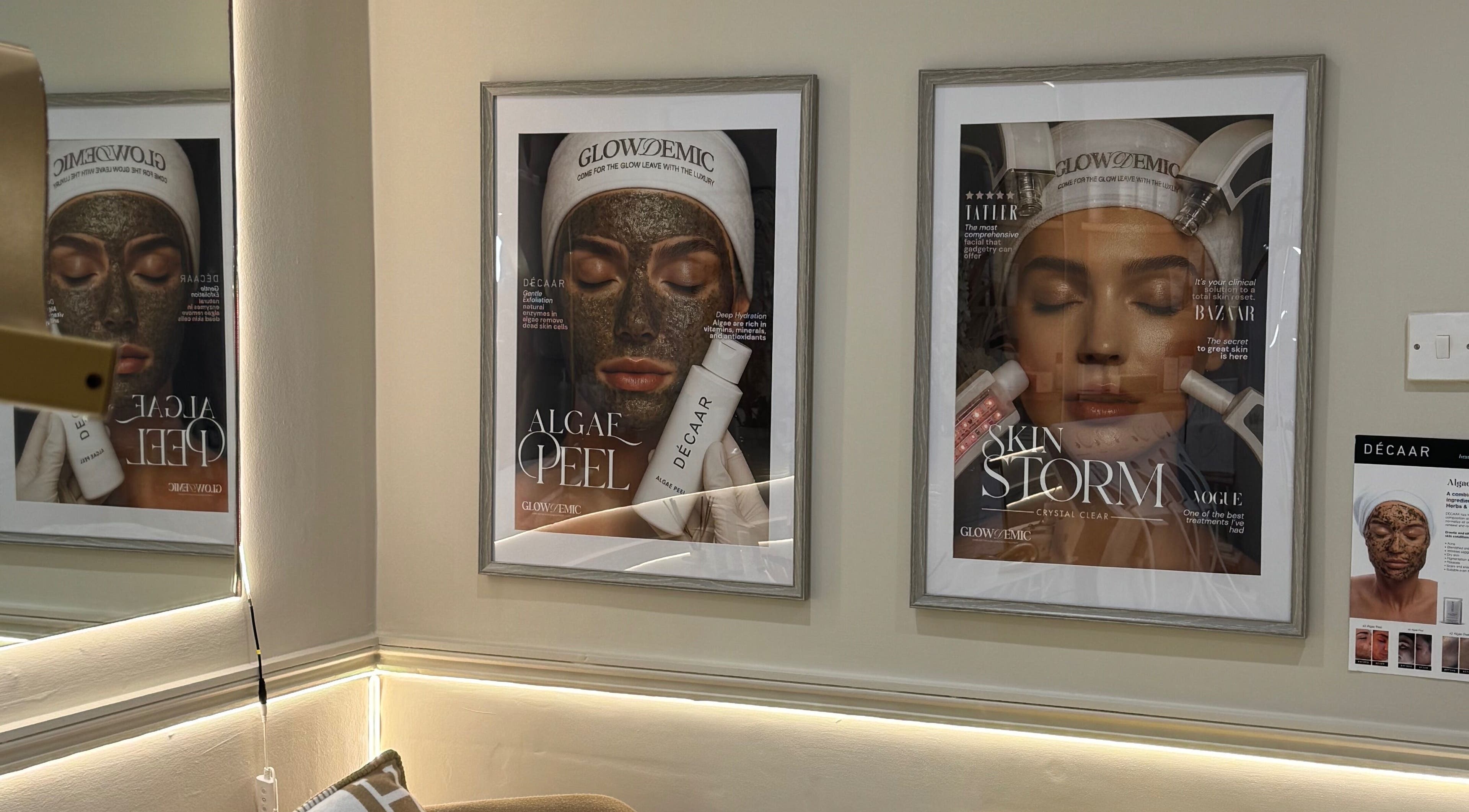 Wall art at GLOWDEMIC, Old Town, Swindon, featuring skincare treatments and vibrant imagery.