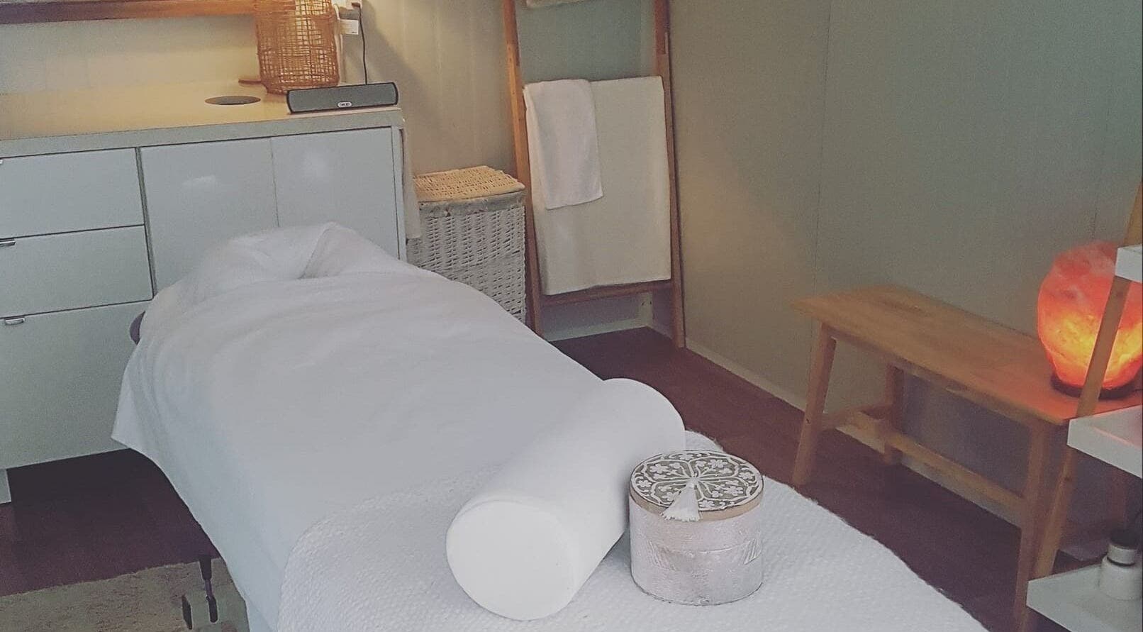Tranquil massage room at My Little Oasis, Palmerston North, Manawatū-whanganui, NZ with cozy lighting and decor.