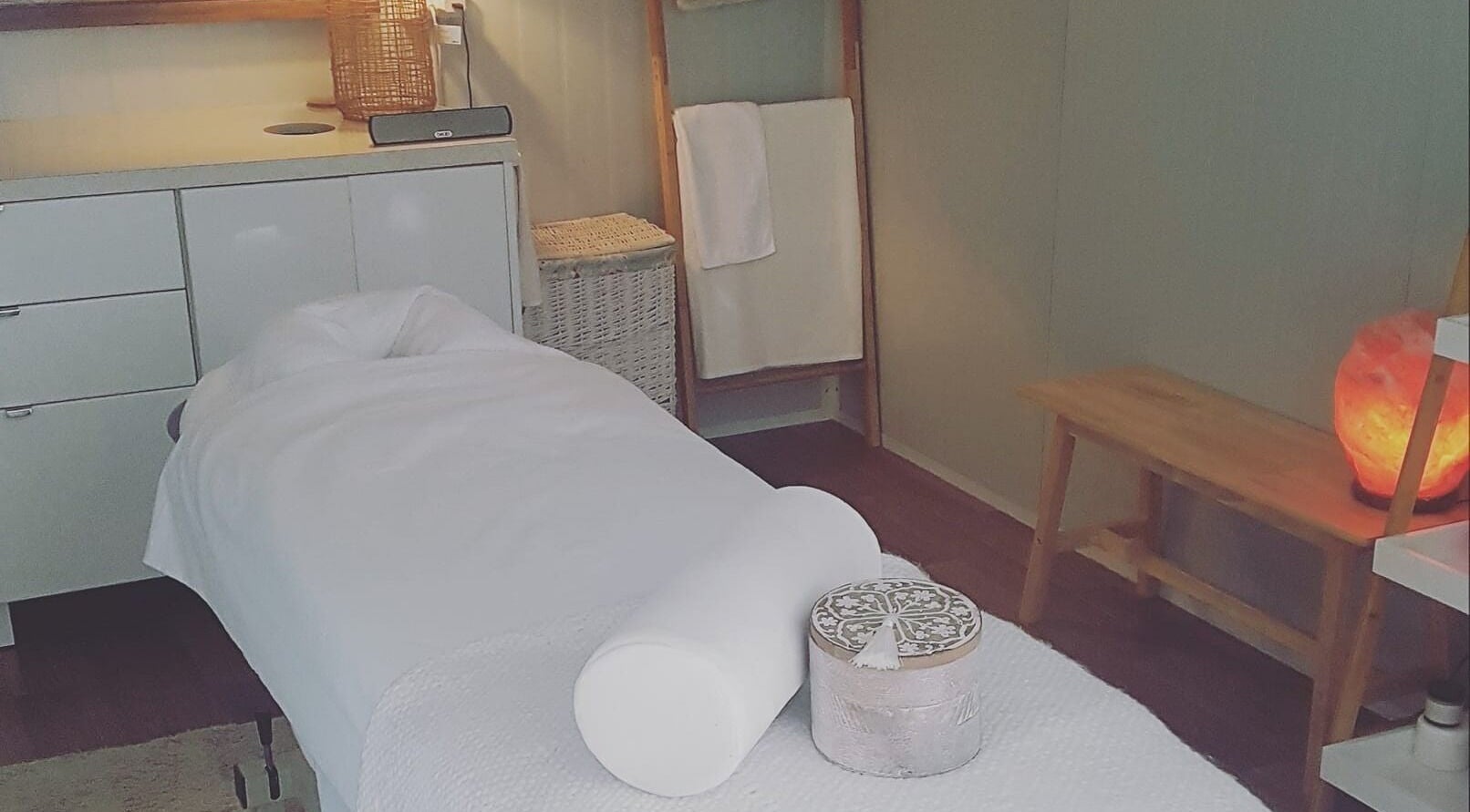 Tranquil massage room at My Little Oasis, Palmerston North, Manawatū-whanganui, NZ with cozy lighting and decor.