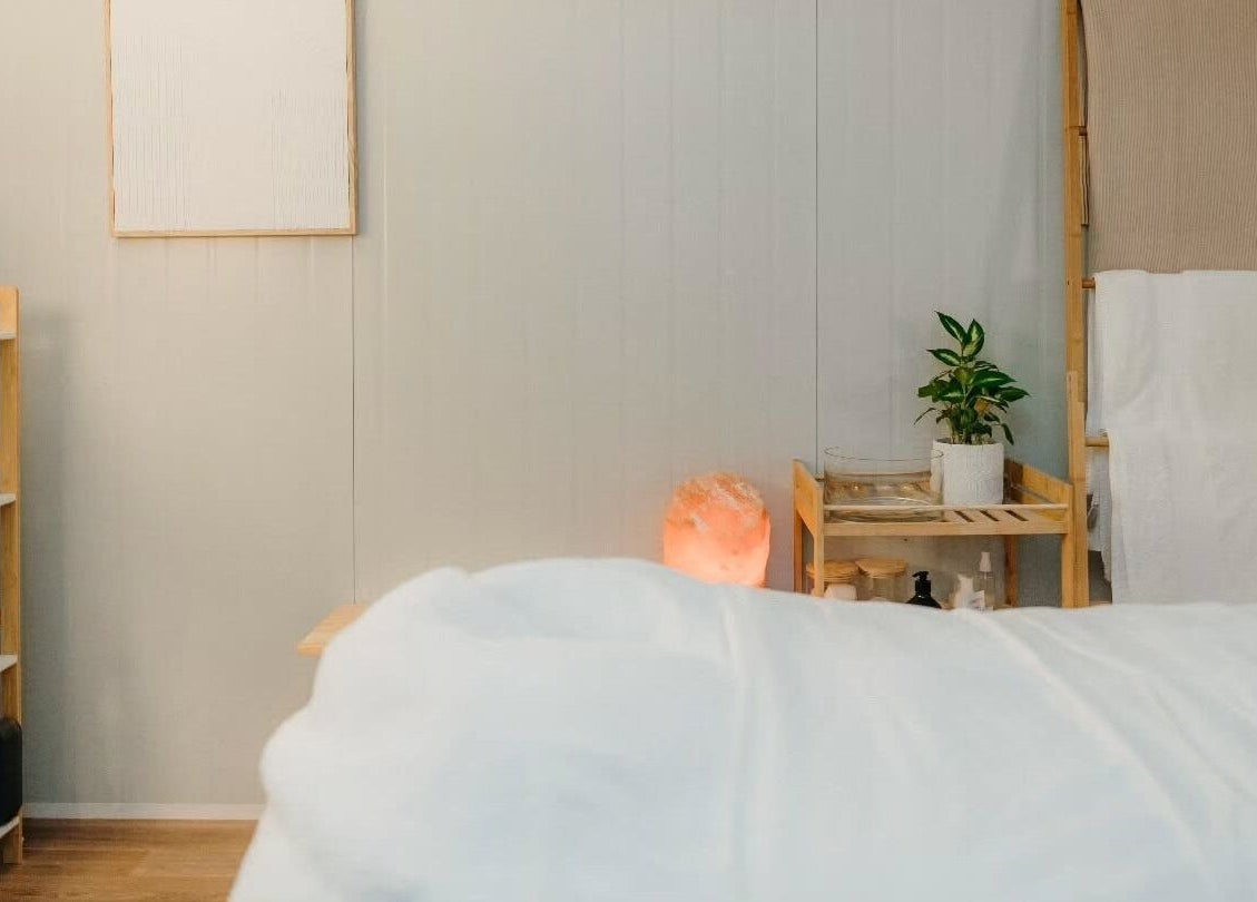 Tranquil spa room at My Little Oasis, Palmerston North, Manawatū-whanganui, NZ, showcasing a calm, inviting ambiance.