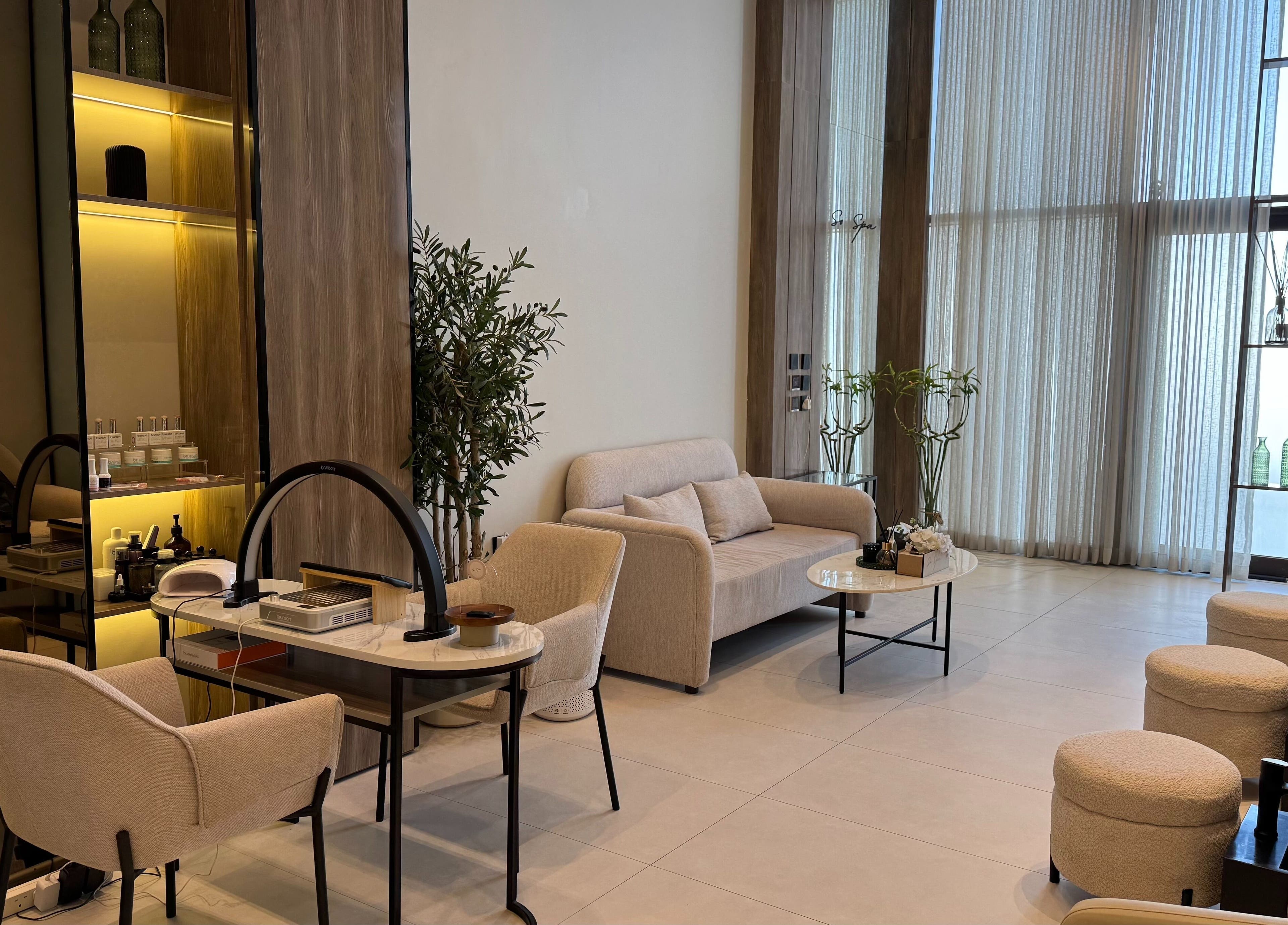 Luxurious seating area at So Spa, Riyadh, Riyadh Province, SA with modern decor and cozy ambiance.