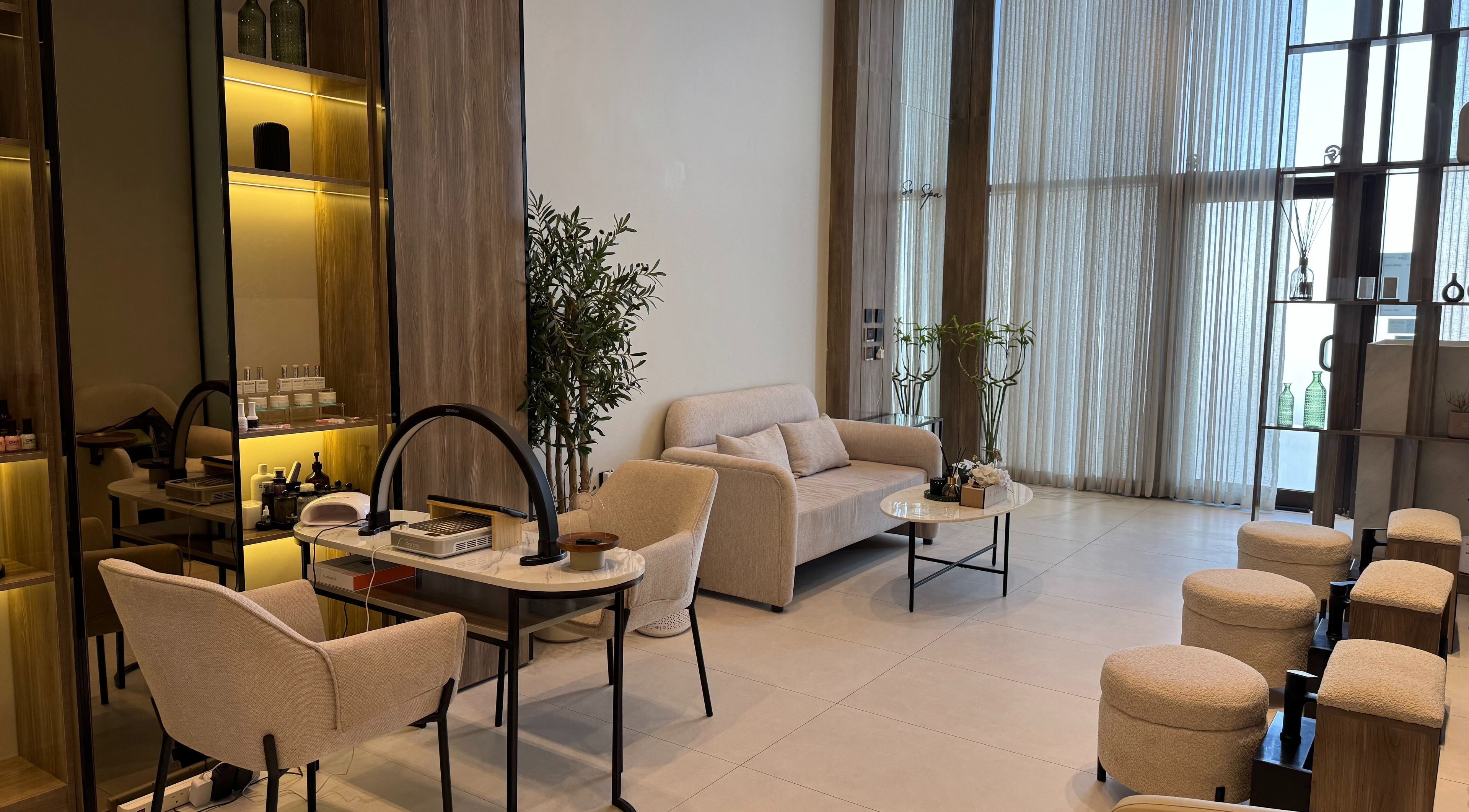 Luxurious seating area at So Spa, Riyadh, Riyadh Province, SA with modern decor and cozy ambiance.