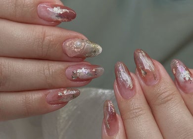 Elegant nail art with pink and gold accents at Niko Nail Studio, La Verne, California, US.