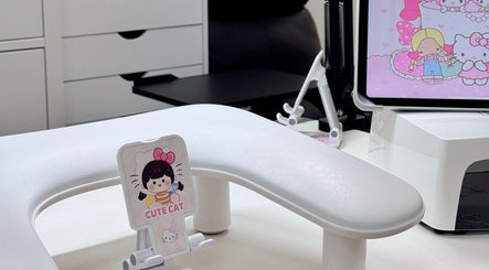 Manicure station at Niko Nail Studio in La Verne, California, US with cute decor and tech setup.