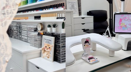 Niko Nail Studio in La Verne, California offers a chic setup with nail polishes and a cozy workspace.